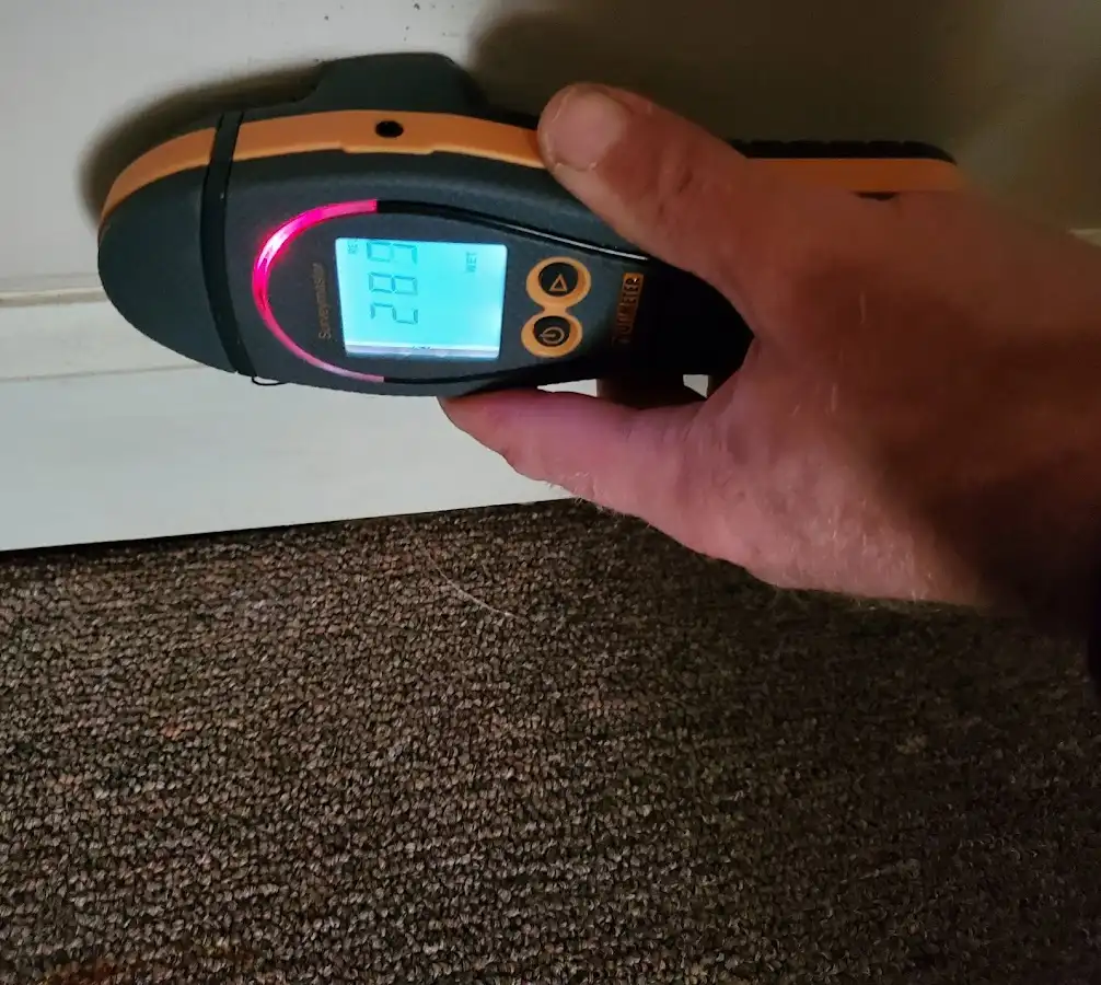 Moisture detection at baseboard during Sewage Cleanup & Sanitation in Liberty Triangle